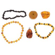 A small selection of amber and resin, including some jewellery