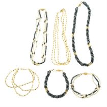 Three sets of cultured pearl jewellery.