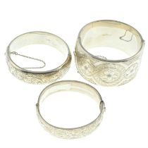 Three silver bangles