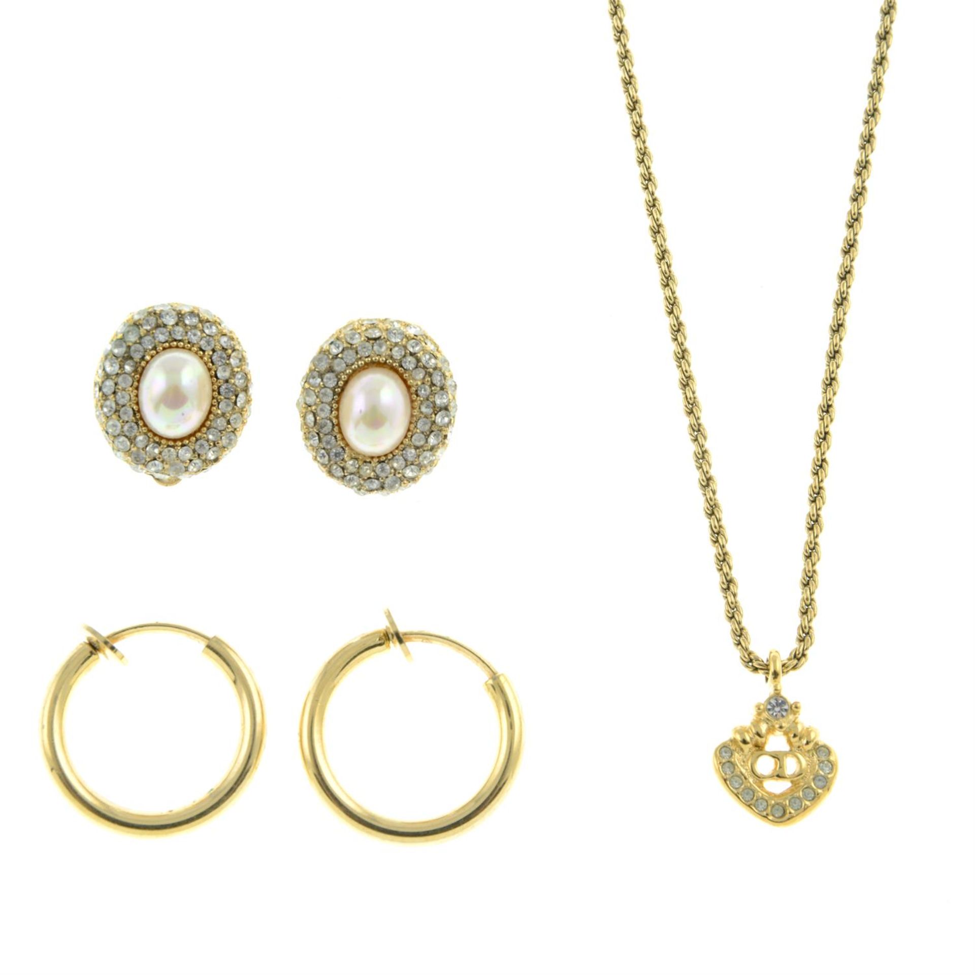 Christian Dior - two pairs of clip on earrings and necklace.