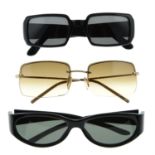 Gucci - three pairs of sunglasses.