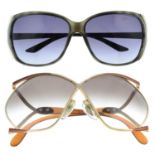 Christian Dior - two pairs of sunglasses.