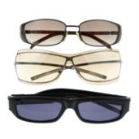 Gucci - three pairs of sunglasses.