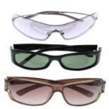 Gucci - three pairs of sunglasses.