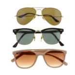 Ray-Ban - three pairs of sunglasses.