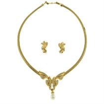 Christian Dior - necklace and clip on earring set.