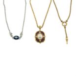 Burberry's - three necklaces.