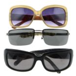 Burberry - three pairs of sunglasses.