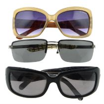 Burberry - three pairs of sunglasses.