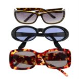 Gucci - three pairs of sunglasses.