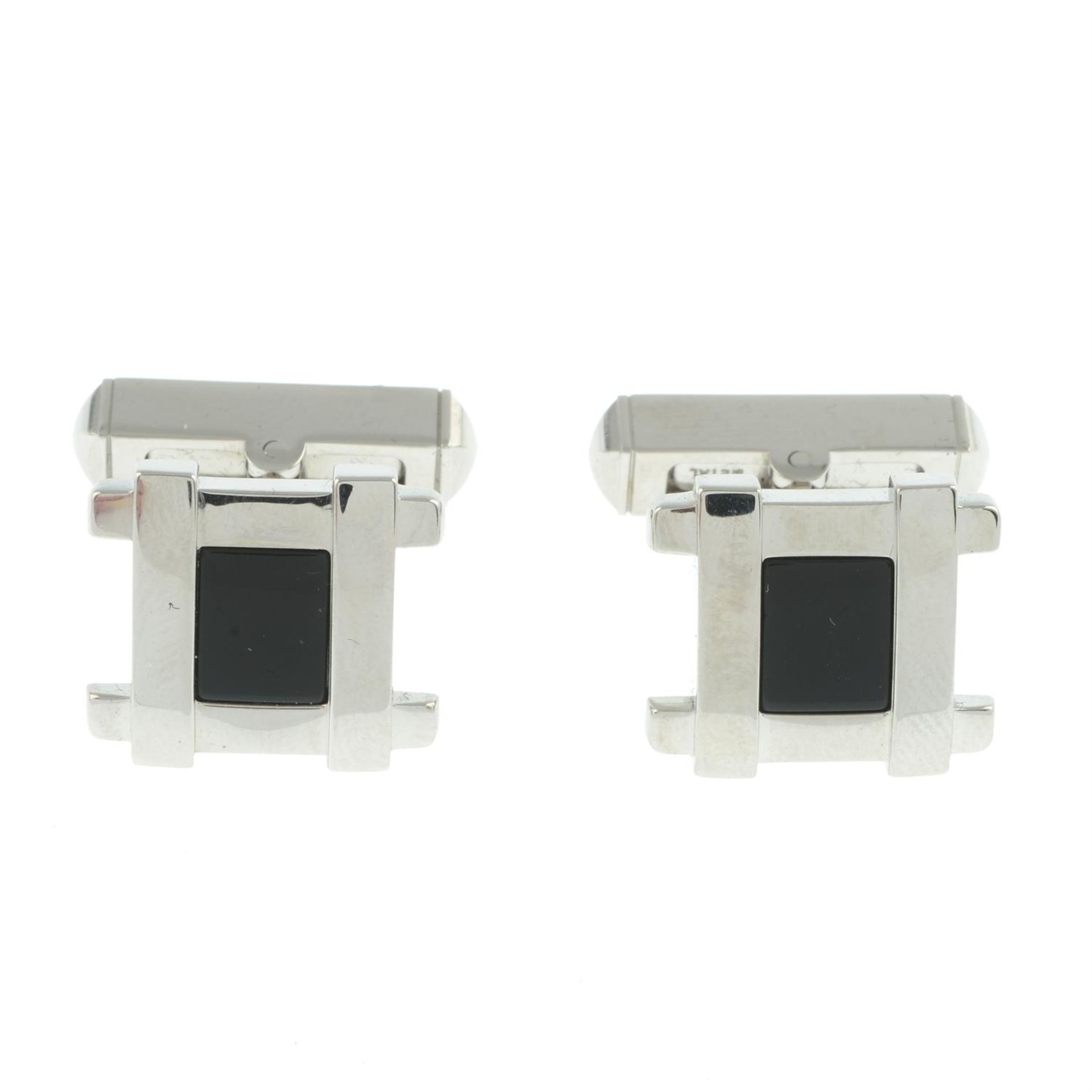 Cartier - silver cufflinks.