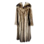 Brown fox fur coat.