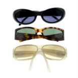 Gucci - three pairs of sunglasses.