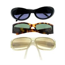 Gucci - three pairs of sunglasses.