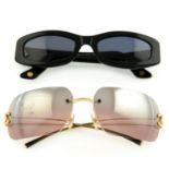 Chanel - two pairs of sunglasses.