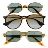 Ray-Ban - three pairs of sunglasses.