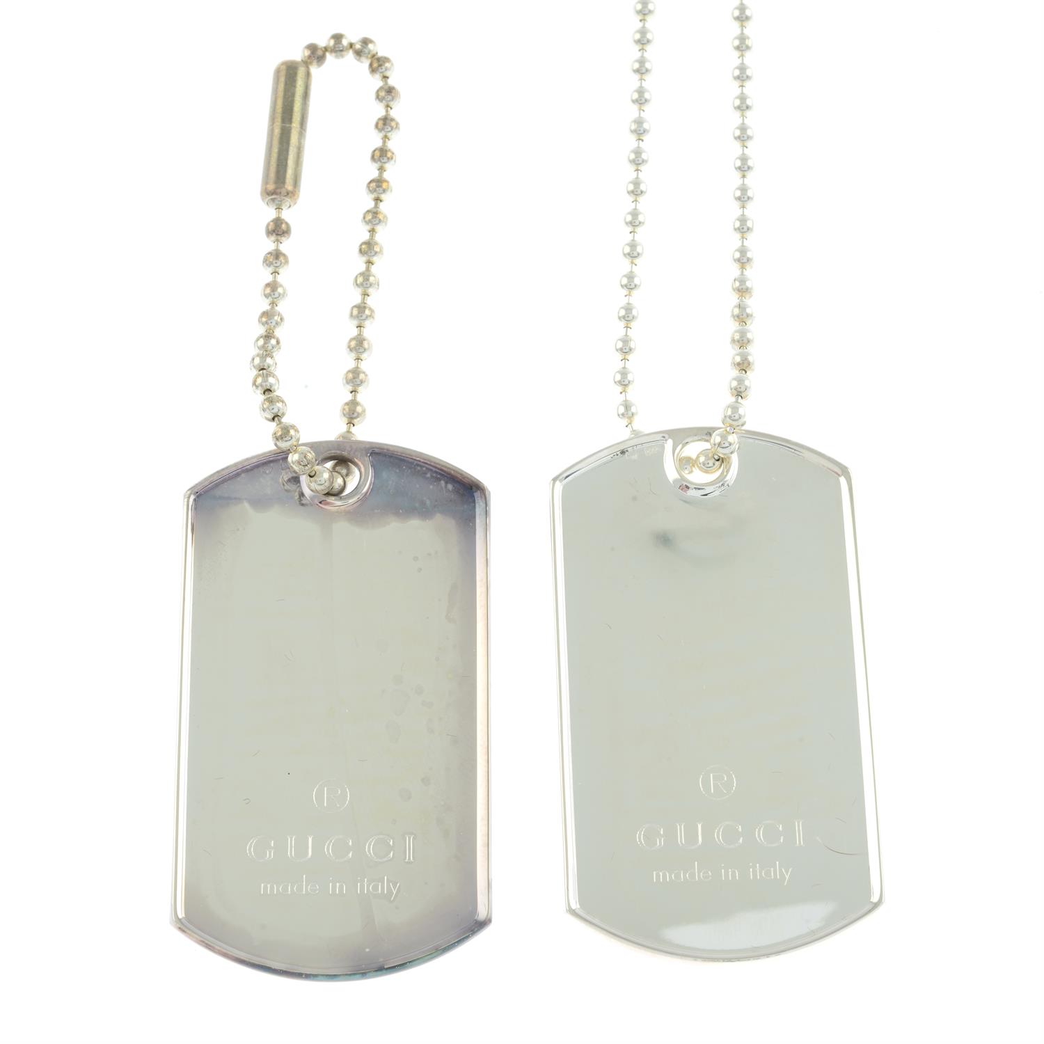 Gucci - two silver dog tags on chain.