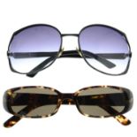 Gucci - two pairs of sunglasses.