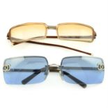 Chanel - two pairs of sunglasses.