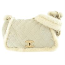 Chanel - CC shearling Flap.