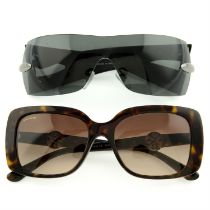 Bulgari - two pairs of sunglasses.