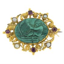 Victorian gold ruby and split pearl cannetille brooch, containing malachite cameo carved to depict