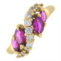 A synthetic ruby and colourless gem dress ring.