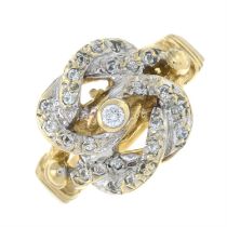 A 9ct gold cubic zirconia knot ring.