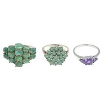 Two emerald cluster rings & an amethyst ring