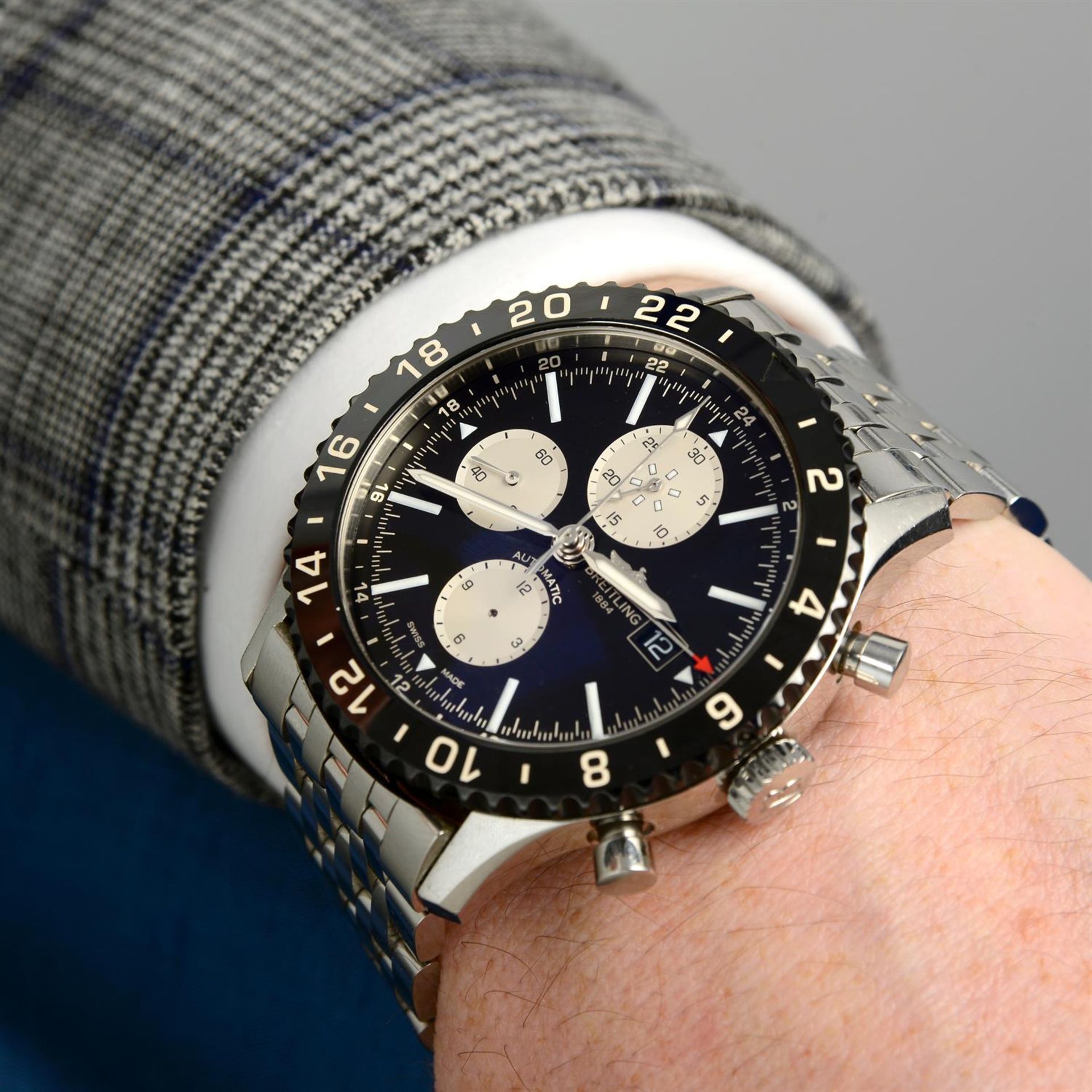 Breitling - a Chronoliner chronograph wrist watch, 47mm. - Image 6 of 6