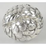 Rolled Pangolin silver sculpture, by Patrick Mavros.