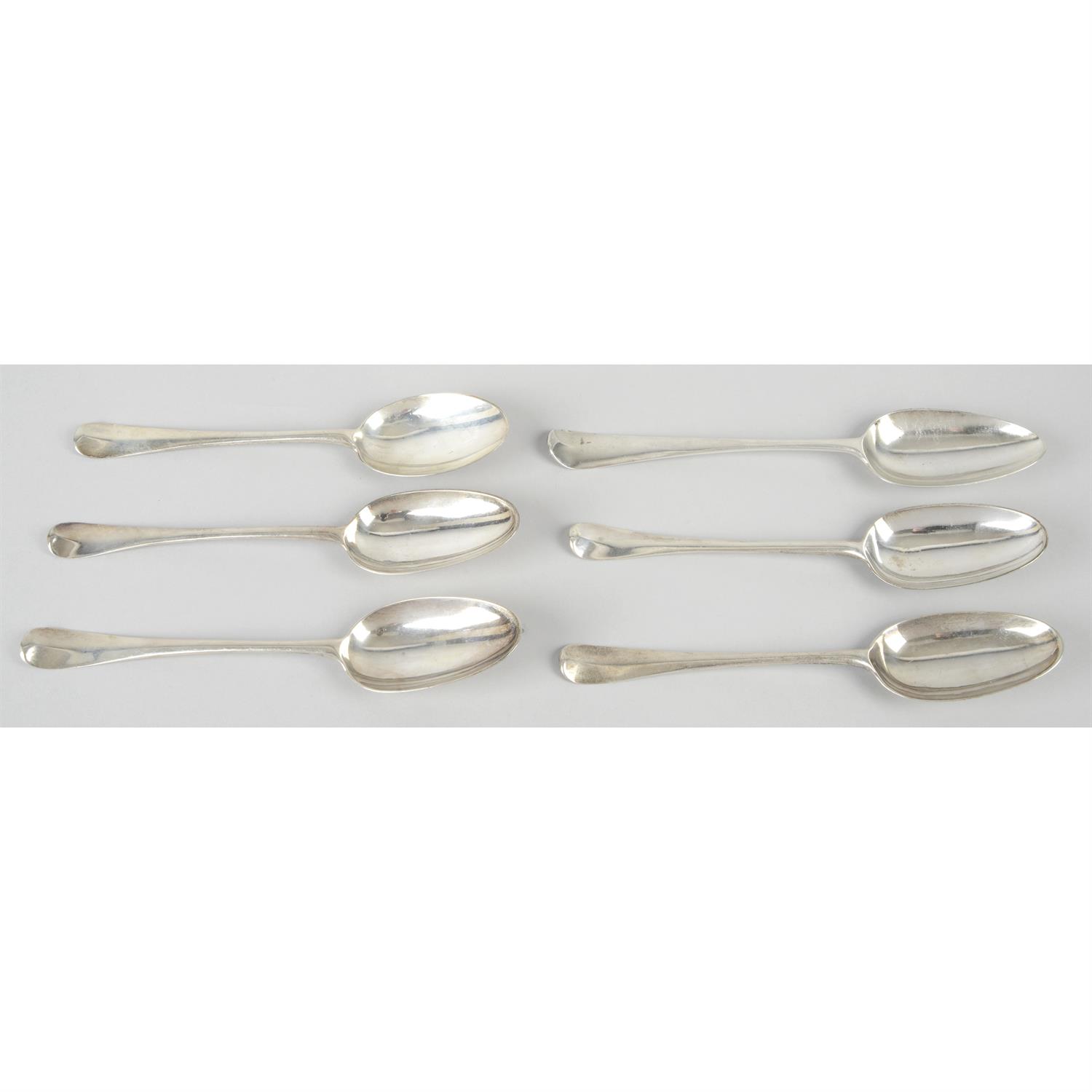 Six assorted 18th century silver Hanoverian pattern table spoons. (6).