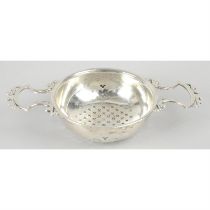 18th century silver lemon or orange strainer.