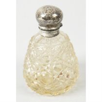 An Edwardian silver mounted & glass scent bottle; together with a mid-20th century silver mounted &