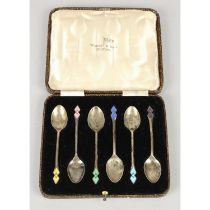 Cased set of 1930's silver & enamel coffee spoons.