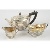 Late Victorian silver three piece bachelor tea service.