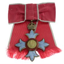 CBE lady's shoulder badge.