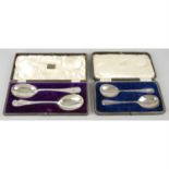 Two early 20th century pairs of cased silver spoons.