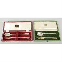 Two cased spoon & fork sets.