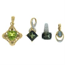 Four gem-set pendants