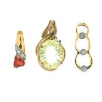 Three gem-set pendants