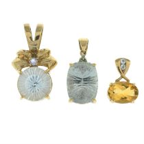 Three 9ct gold gem-set pendants