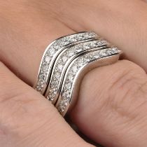 Three diamond wave rings, by Cartier