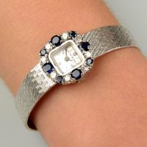 20th c. 18ct gold watch, sapphire & diamond bezel