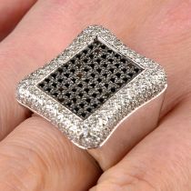 Black gem and diamond ring