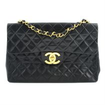 Chanel - quilted Maxi Flap.