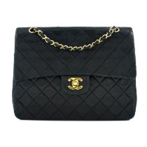 Chanel - quilted CC Double Flap.