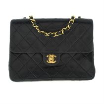 Chanel - quilted CC Square Single Flap.