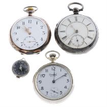 A group of four pocket watches.
