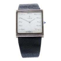 Corum - a Buckingham wrist watch, 35x35mm.